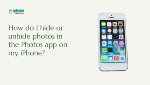 How do I hide or unhide photos in the Photos app on my iPhone?